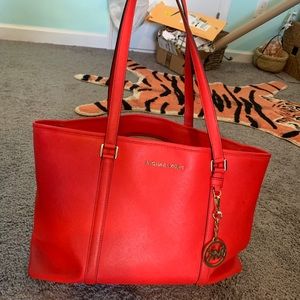 Red Michael Kors bag